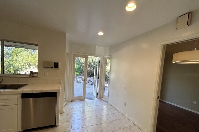 Breakfast area with door leading to outside - 17218 Escalon Dr