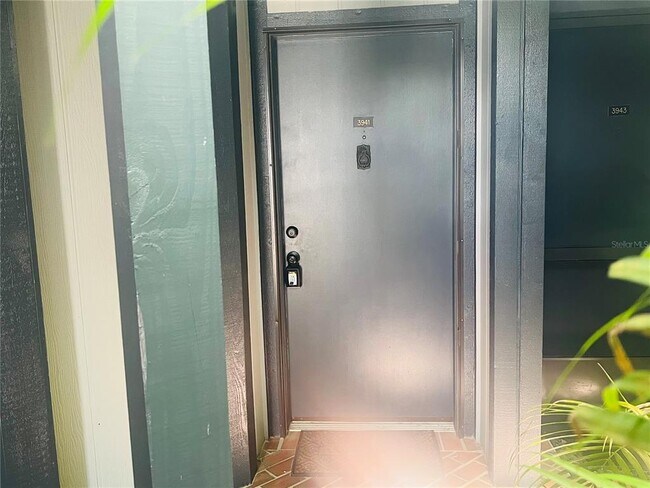 Building Photo - 3941 Atrium Dr Unit L3