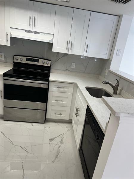 Building Photo - 5011 Wiles Rd Unit 204 Rental