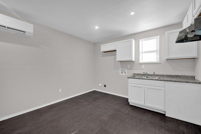 Photo - 2103 N Marrs St Unit 2103 N Mars (Back)
