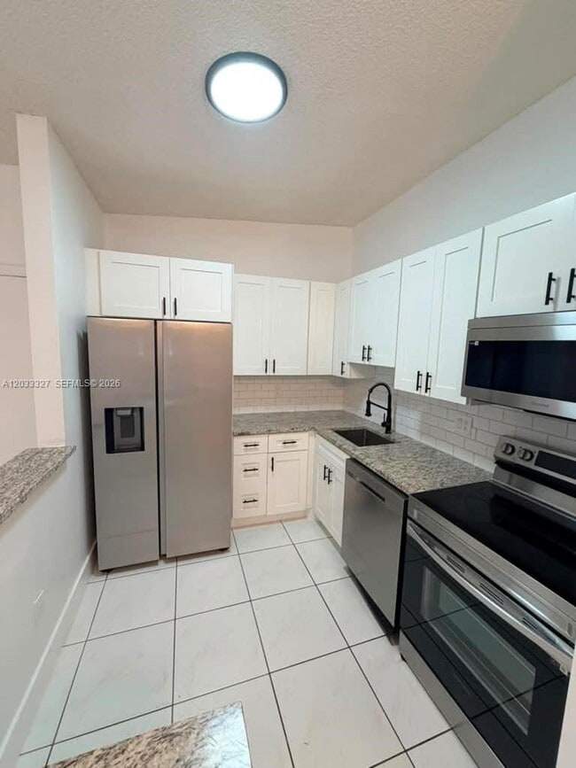 Photo - 9499 W McNab Rd Unidad 208