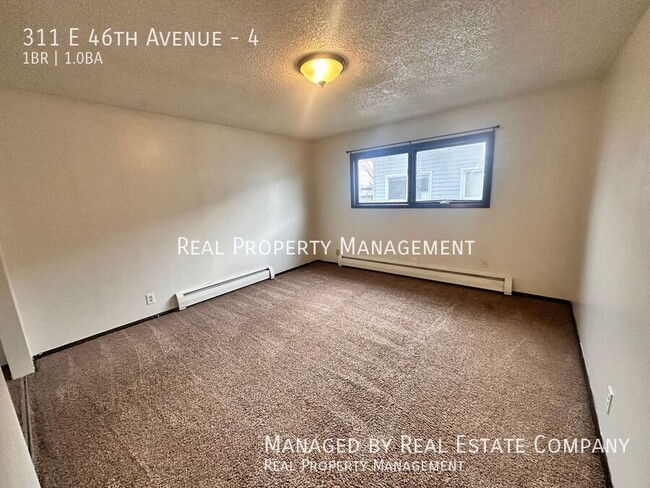 Photo - 311 E 46th Ave Apartment Unit 4