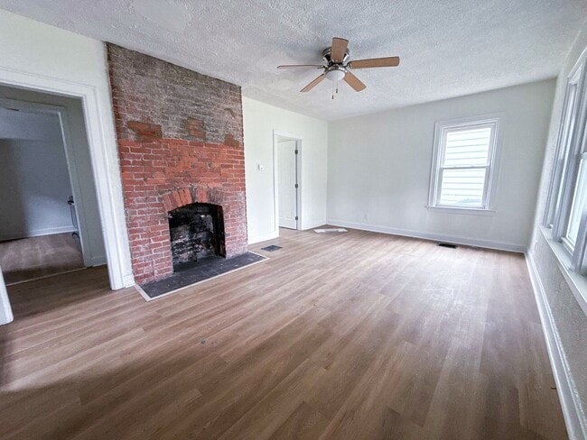 Photo - Newly Rehabbed 4BR Home w/ Front Porch, Back Deck & Full Basement