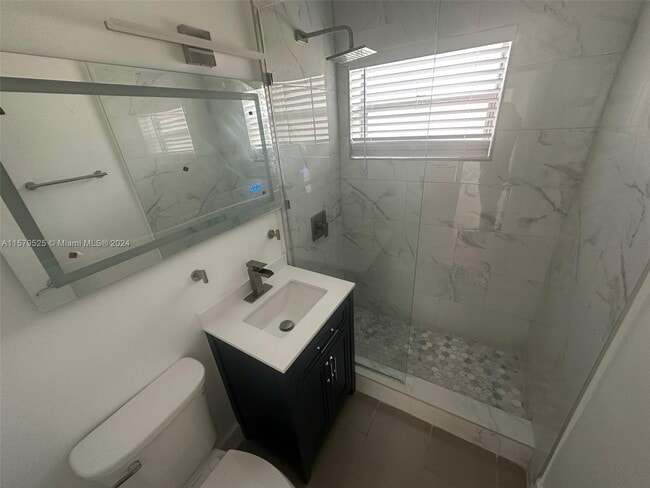 Building Photo - 9033 Harding Ave Unit 3 Rental