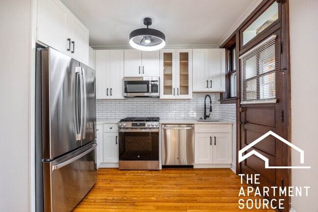 Building Photo - 3126.5 N Spaulding Ave Unit 2E