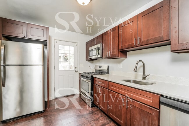 Photo - This highly desirable 4 bedroom, 2 bathroom home is ready for your personal touch!