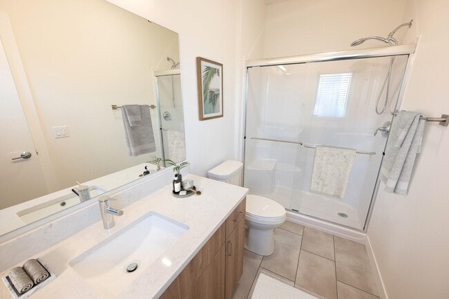 Quartz countertops and step-in showers