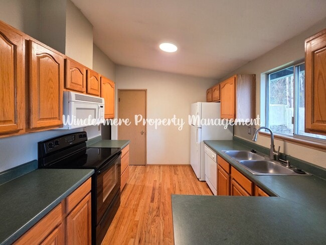 Photo - 3 bed Rambler in Convenient CK location with fully fenced yard and large deck