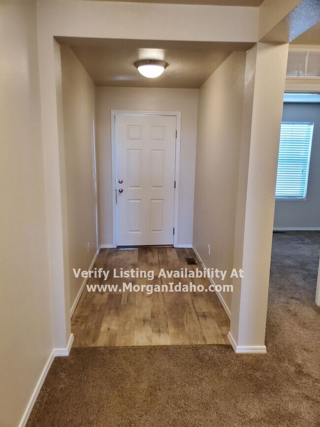 Photo - Office, vaulted ceilings, 2-car garage and...