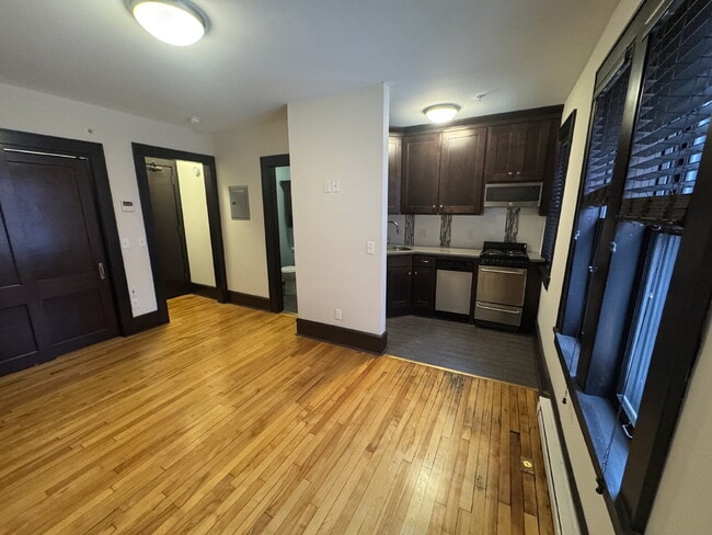Photo - "Charming Studio Retreat with Hardwood Elegance in Downtown Minneapolis!"