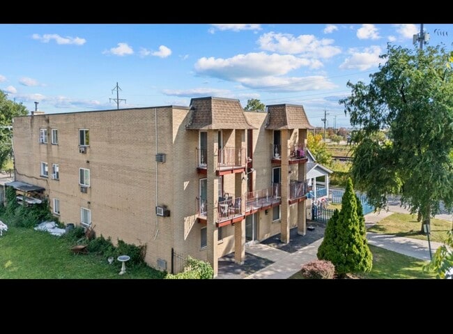 Building Photo - 3243 S 49th Ave Unit 301