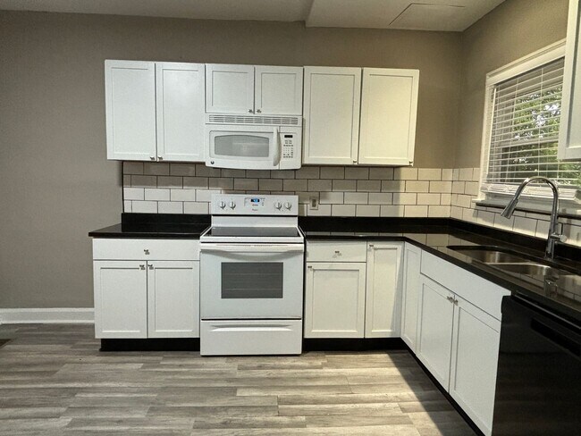 Photo - 3-Bed, 1-Bath Home – Fenced Yard, Off-Street Parking, Spacious Kitchen & In-Unit Laundry