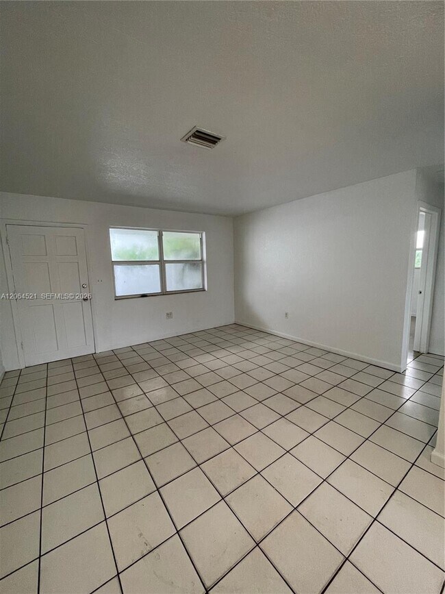 Building Photo - 1243 NW 61st St Unit 3
