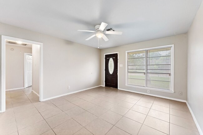 Photo - Beautifully remodeled 4 bedroom bath and a half with ceramic tile through out and laminate floori...