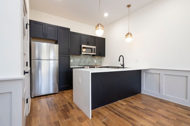 Photo - Spacious 2-Bedroom Apartment for Rent Unit 1st Floor Front/Basement