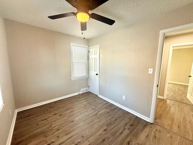 Photo - This beautifully updated 4-bedroom, 1-bath single-family home is ready for move-in!