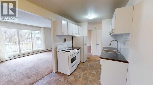 Photo - 9807-9108 108 Ave