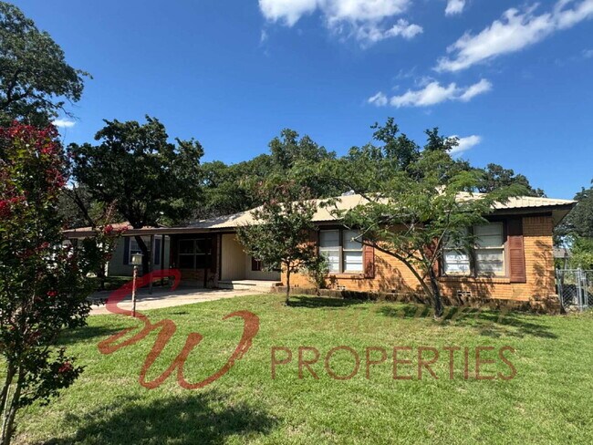 Building Photo - 4 bedroom 2 bath, great neighborhood! One ... Rental
