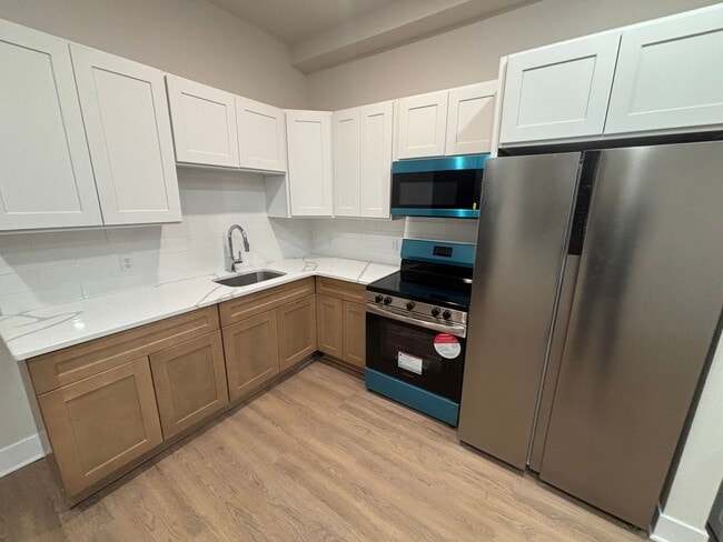 Photo - Fully Remodeled 3-Bedroom Apartment Unit 2
