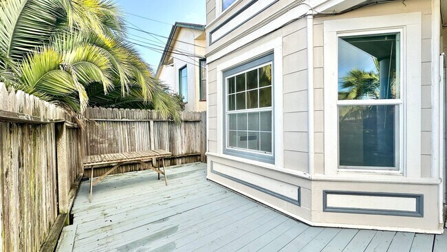 Photo - Sweet ground floor 1 Bedroom with a Sunny Wrap Around Deck and In-Unit Washer & Dryer Unit B