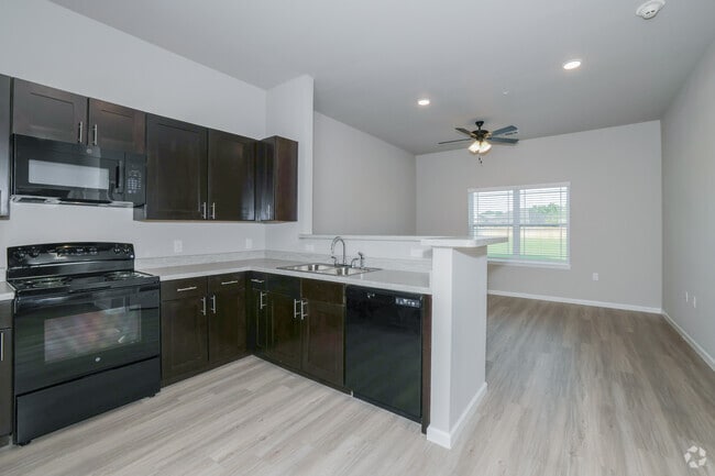 1BR, 1BA - 702SF - Living Area and Kitchen