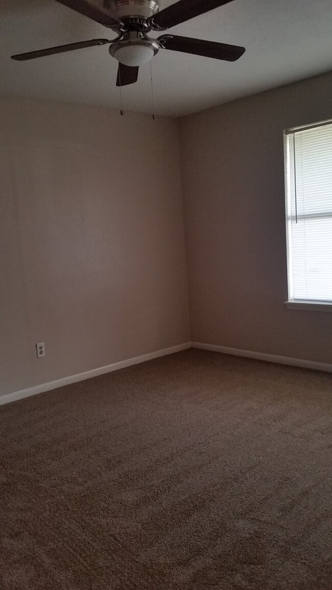 Photo - The right side unit of this duplex offers a comfortable and functional layout ideal for small fam...