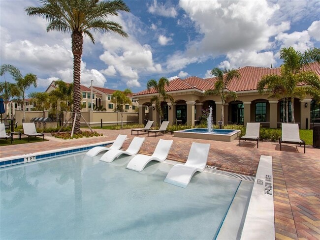 Resort-Inspired Beach Entry Pool with Sundeck.