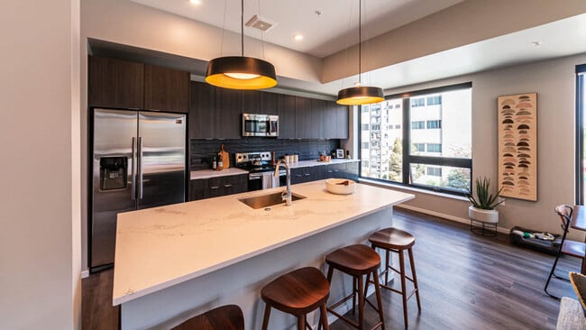 Kitchen with Stainless Steel Appliances and Breakfast Bar