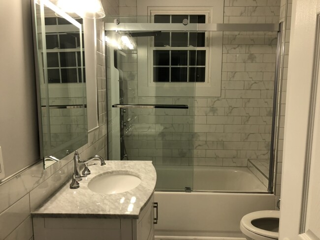 Bathroom 1 - Bathtub - 16 Avenue E Apartments Unit 1