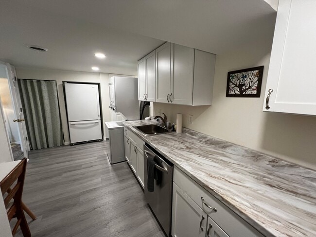 Kitchen view from stove - 205 Palomino Dr Unit 1 Bed 1 Bath Cozy Apt.