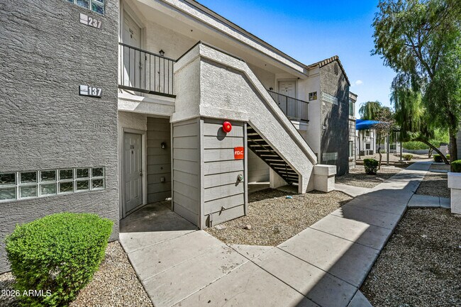 Building Photo - 3065 N 67th Ave Unit 137