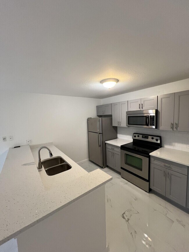 Building Photo - 1845 Palm Cove Blvd Unit 8-103