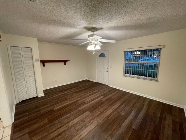 Photo - Beautiful 2/2 with large yard, Florida room, new floors, and updated bathrooms!