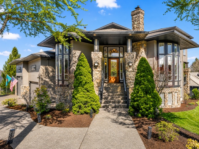 Building Photo - Stunning 5-Bedroom Bull Mountain Estate with Dual Living, Chef's Kitchen & 4-Car Garage