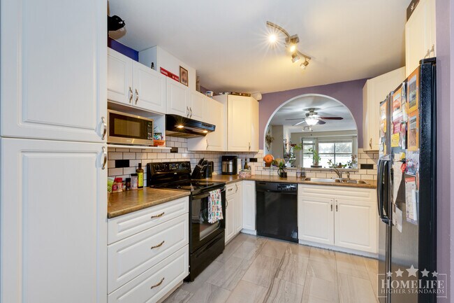 Photo - Never-before seen massive 2 bed 2 bath condo in the heart of Surrey Central! Unit 16