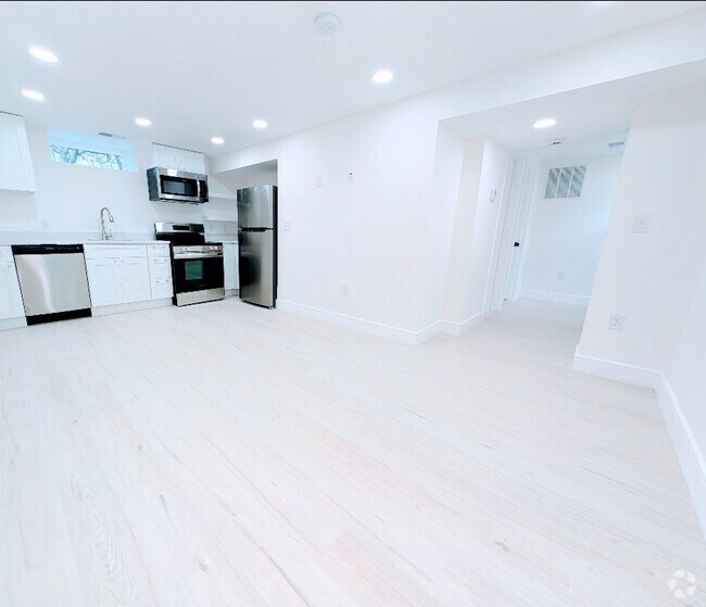 Building Photo - Fully Renovated, Sunny Basement Apartment Unit ,  1