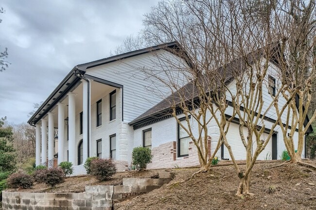 Photo - Furnished Estate Home - Double Curved Stairway - Marble Floors - Waterfall Island