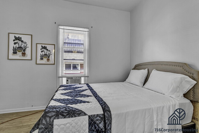 Photo - Furnished 2-Bedroom Second-Floor Apartment Near Elmwood Village Unit 2