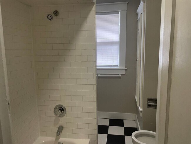 Photo - Charming 3-Bedroom Midtown Bungalow with Hardwood Floors & Spacious Backyard Deck