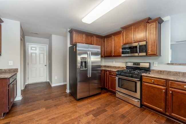 Photo - Spacious 5-Bed, 3.5-Bath Residence with 4,003 Sqft, Master on 1st Floor, Elegant Design, & Versat...