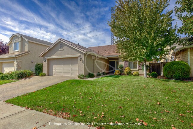 Building Photo - Charming single-story home nestled in the serene Edgewater Community