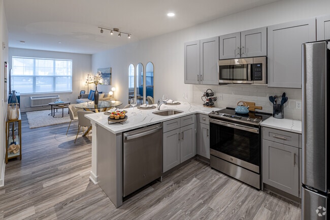 1BR, 1BA + Den - 690SF - Kitchen/Dining/Living Room