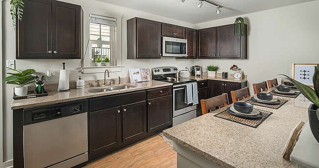 Cocina modelo 01 - Cabañas en San Marcos, Texas - Cottages at San Marcos Townhomes