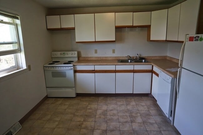 Photo - AVAILABLE JUNE 1ST 2026 - 4 bed, 2 bath home available!