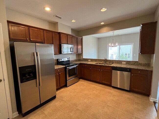Photo - **OFFERING REFUNDABLE APPLICATION FEES** Fantastic 3BD, 2.5BA North Raleigh Townhome with Fenced ...