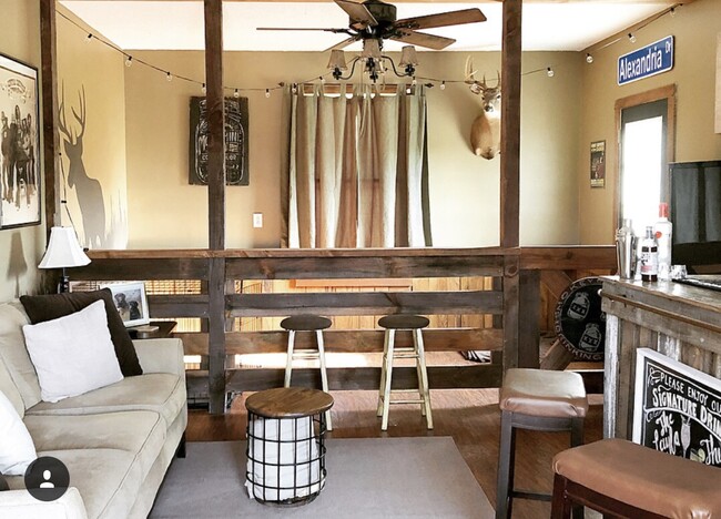 Man cave/bonus room. We built this “coral” for our pups. It has its own door to outside. - 4422 Meadowland Dr House