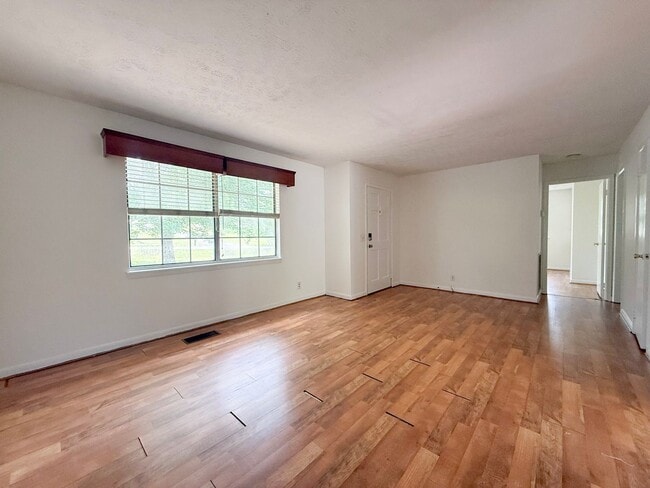Photo - 2-Bedroom Home with Bonus Room & Large Wooden Deck | Pet-Friendly Near I-40 & City Lake