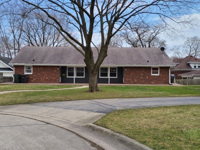 Front of side-by-side duplex. Shared front porch.