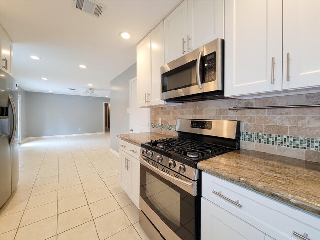Photo - 3 Bed Home for Rent in Westbury 77035 with Large Fenced Yard & Deck