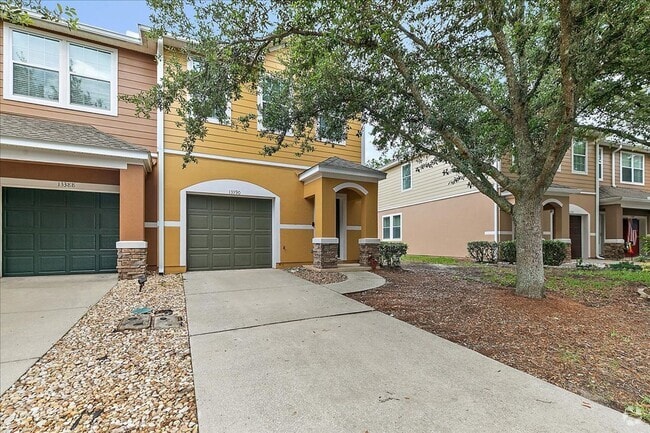 Building Photo - Enjoy Stylish Townhome Living in Vibrant B...